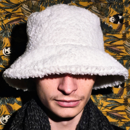 White fluffy bucket hat by Bougie Boujev.